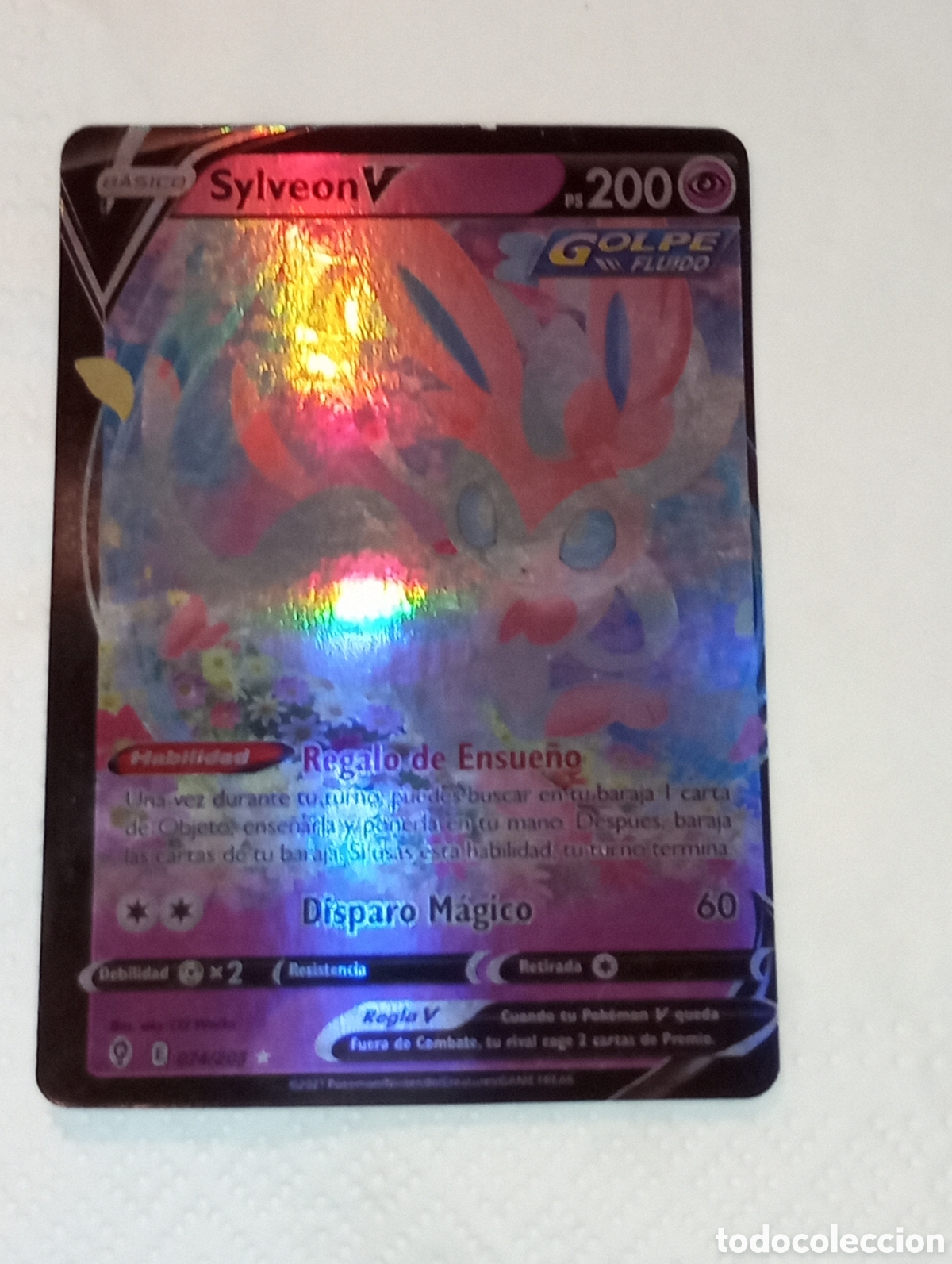 Juguetes antiguos y juegos de colecci&oacute;n: Carta Pok&eacute;mon silveon V golpe fluido n&uacute;mero 074/203