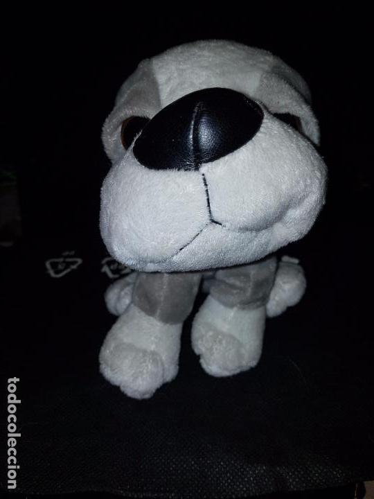 peluche perro cabezon