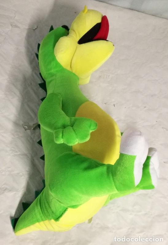 dinosaurio de peluche grande