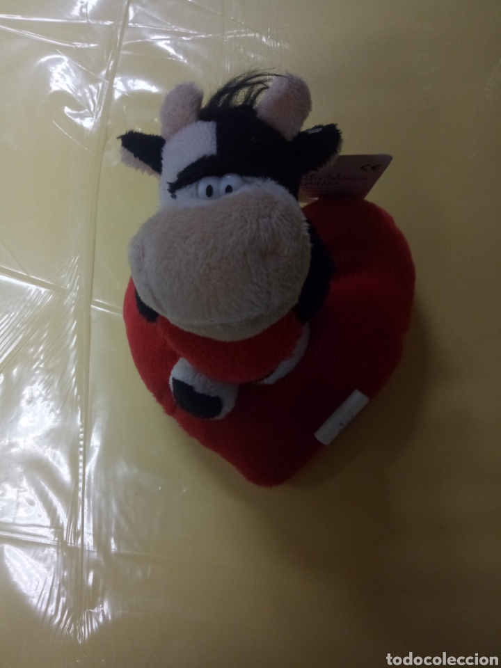 Juguetes antiguos: Peluche vaca sobre coraz&oacute;n. - Foto 1