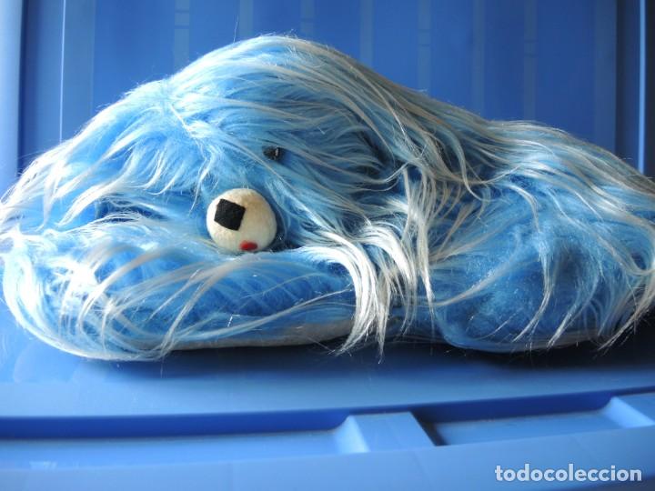 peluche perro azul