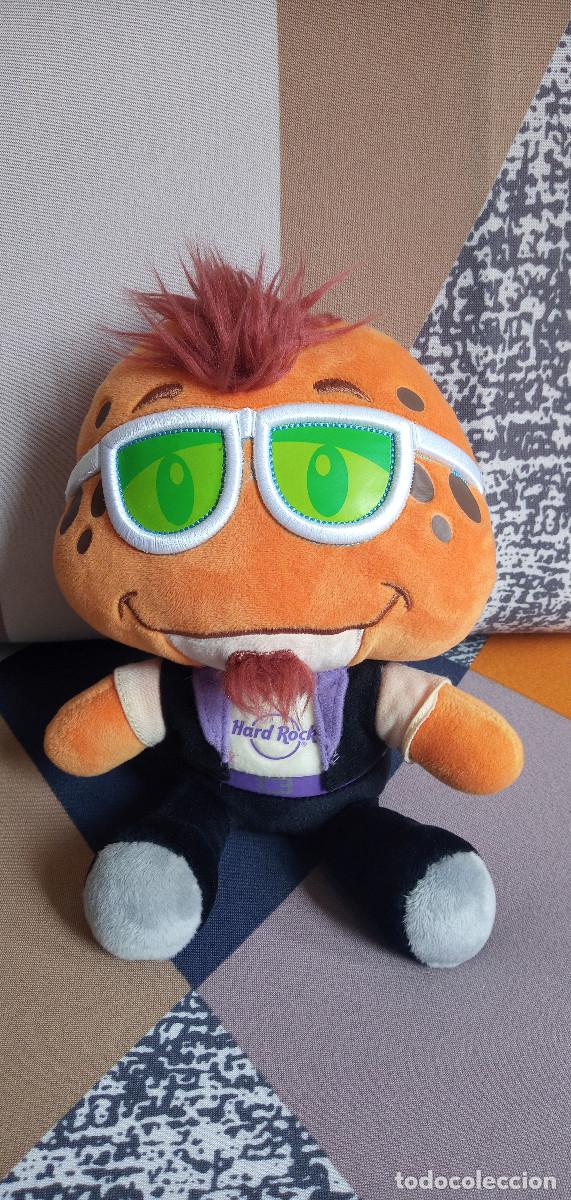 Juguetes antiguos: Peluche Hard Rock Caf&eacute; rockero naranja con gafas verdes y cresta &ndash; 22 cm aprox.