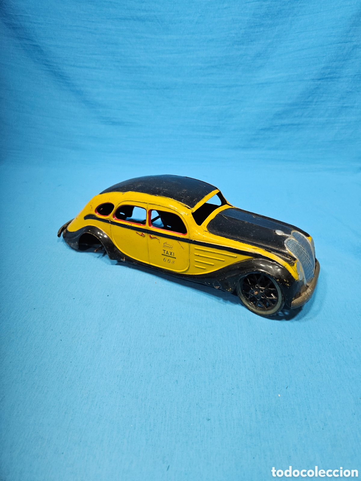 Juguetes antiguos Pay&aacute;: TAXI BARCELONA AIRFLOWER PAYA HOJALATA