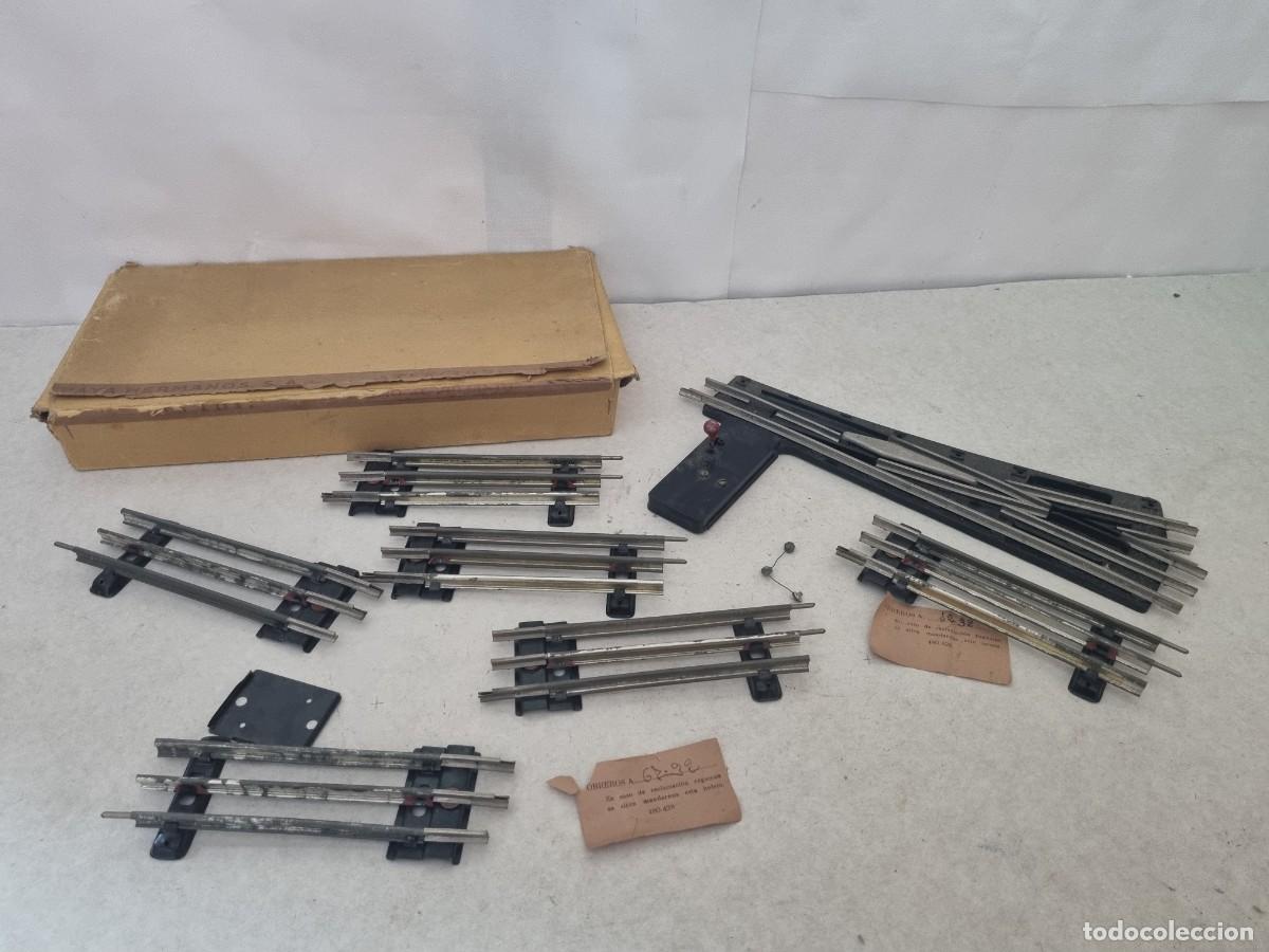 Juguetes antiguos Pay&aacute;: Lote de v&iacute;as e intercambiador Paya