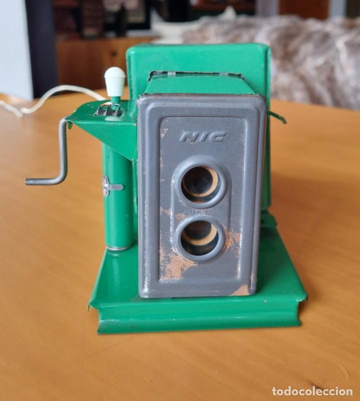 Juguetes antiguos: Proyector NIC - Foto 1