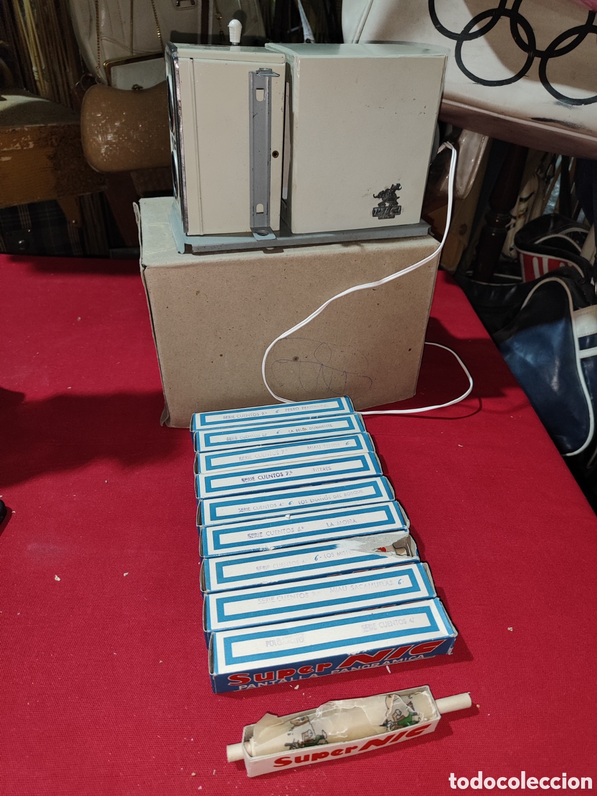 Altes Spielzeug: Antiguo proyector NIC y lote de 10 peliculas