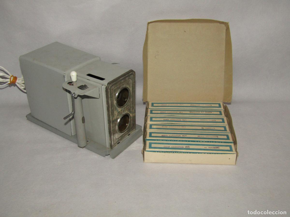 Juguetes Antiguos: Antiguo Proyector de Cine Infantil SUPER NIC + Caja Completa de Pel&iacute;culas