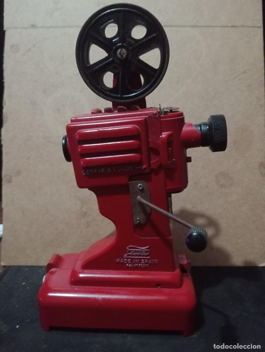 Altes Spielzeug: proyector de cine de Paya