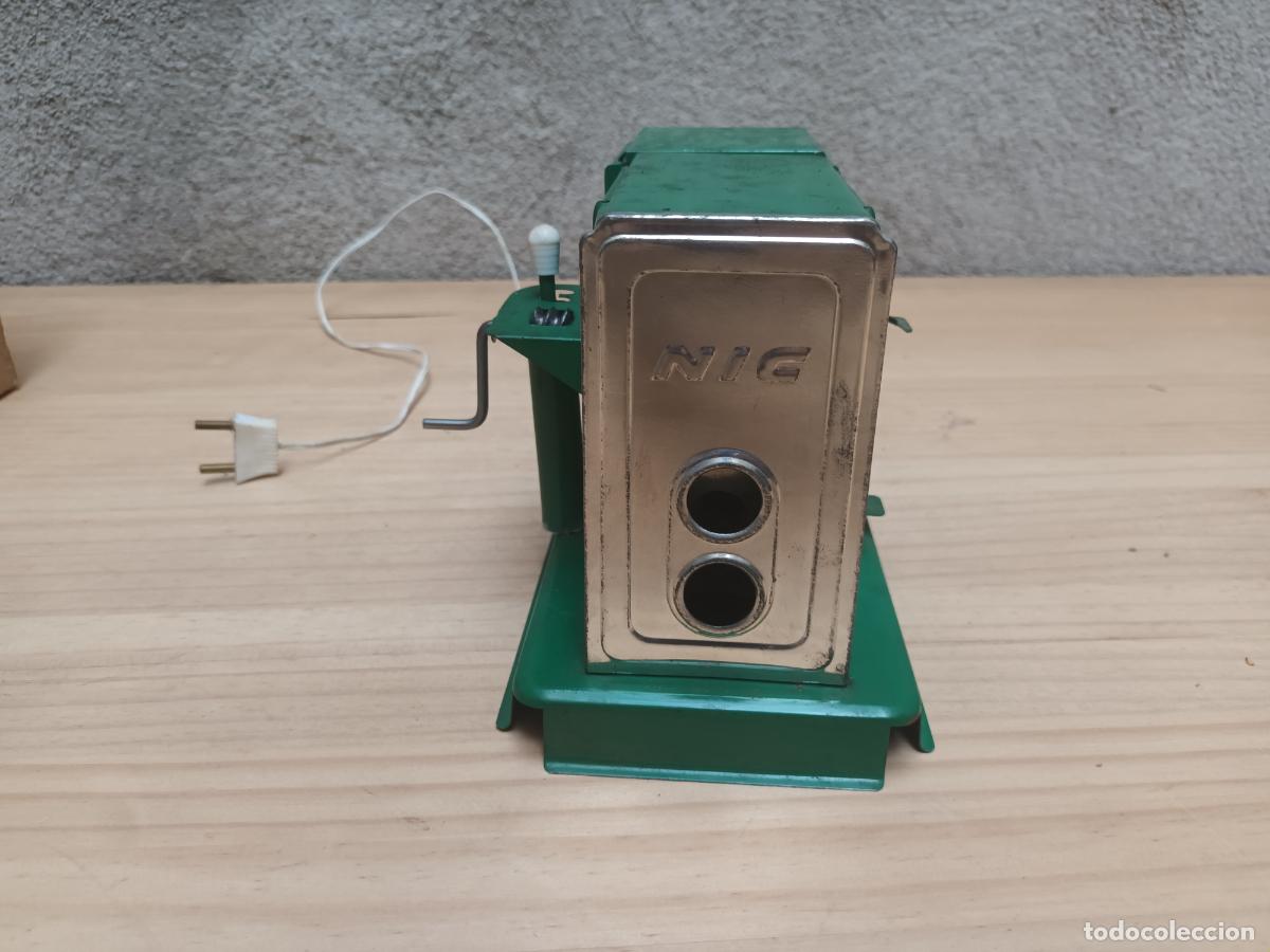 Juguetes antiguos: PROYECTOR CINE NIC CAJA.