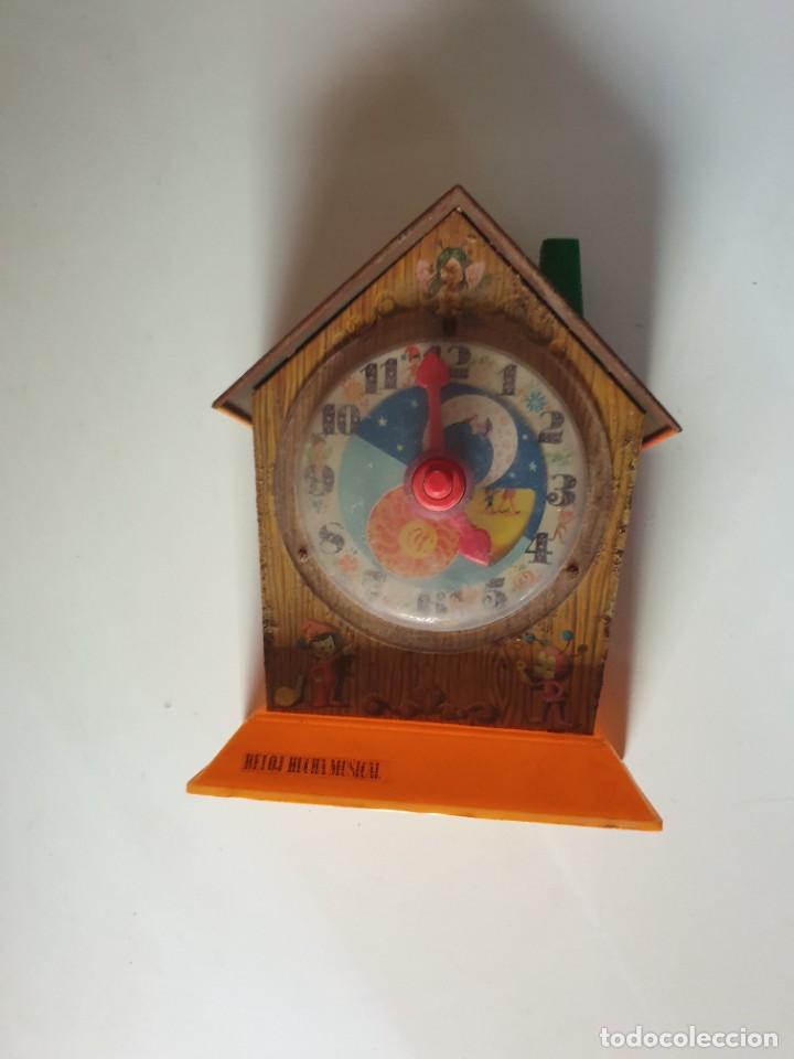 Juguetes antiguos Rico: HUCHA RELOJ MUSICAL - Foto 1