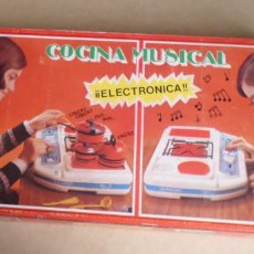 Juguetes antiguos Rico: COCINA MUSICAL ELECTRÓNICA RICO - SIN USAR SACADOS DE UNA JUGUETERÍA ANTIGUA PRECIOS EN PESETAS