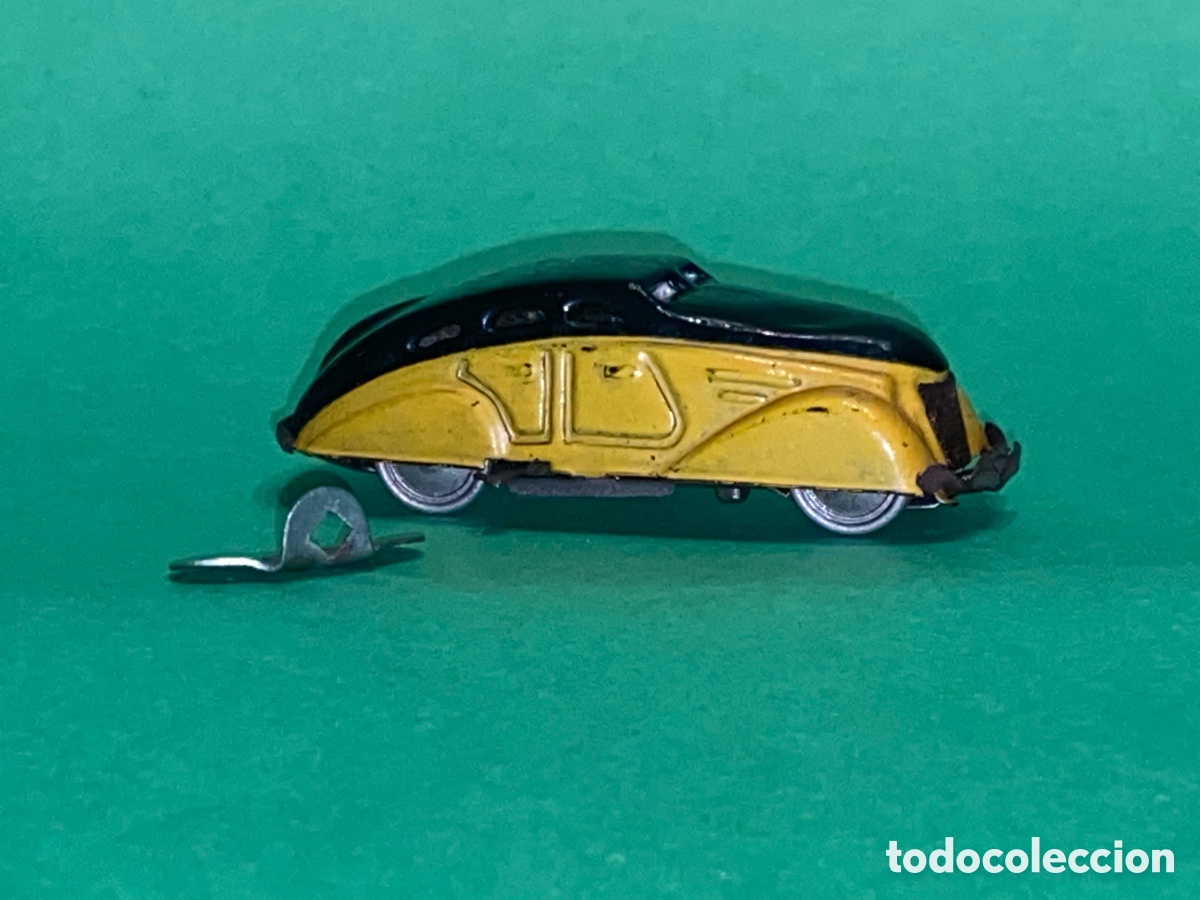 Juguetes antiguos Rico: Taxi Barcelona Pulga Rico, a&ntilde;os 40, con su llave.