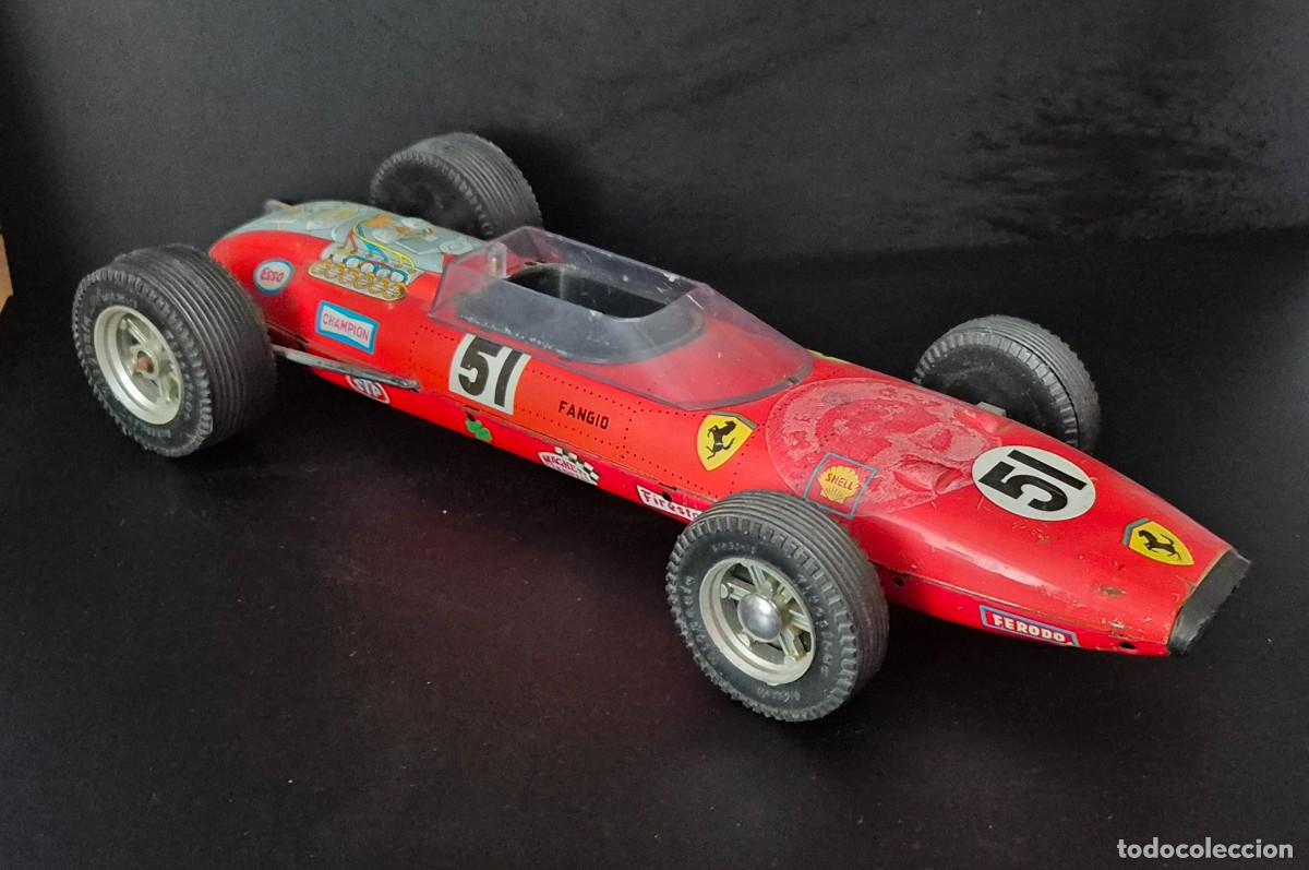 Juguetes antiguos Rico: COCHE HOJALATA RICO F.1 FERRARI FANGIO LA FRICCION FUNCIONA, DESCONOZCO SI FALTA ALGUNA PIEZA O