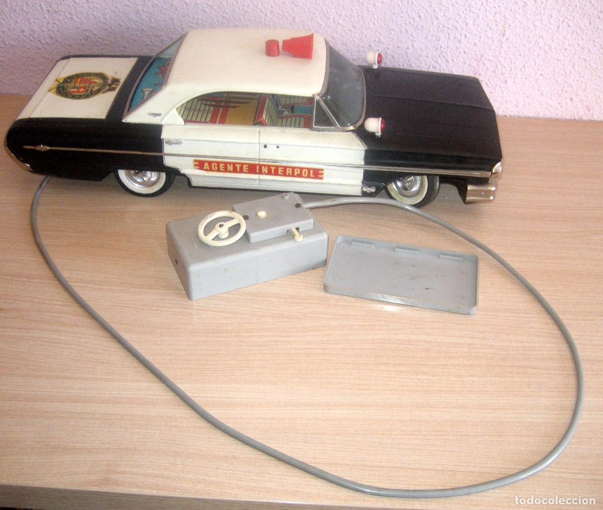 Juguetes antiguos Rico: FORD GALAXIE AGENTE INTERPOL CONDUCIDO CABLE FUNCIONANDO
