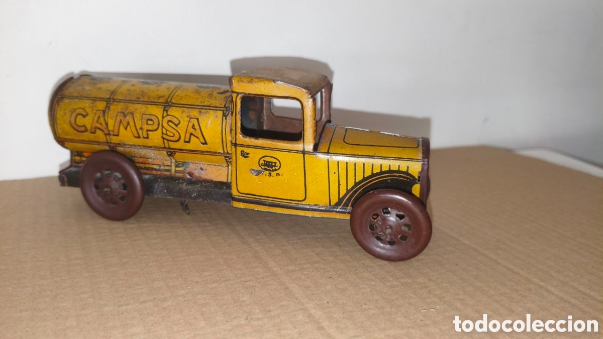 Juguetes antiguos Rico: camion campsa de hojalata marca rico, amarillo muy raro
