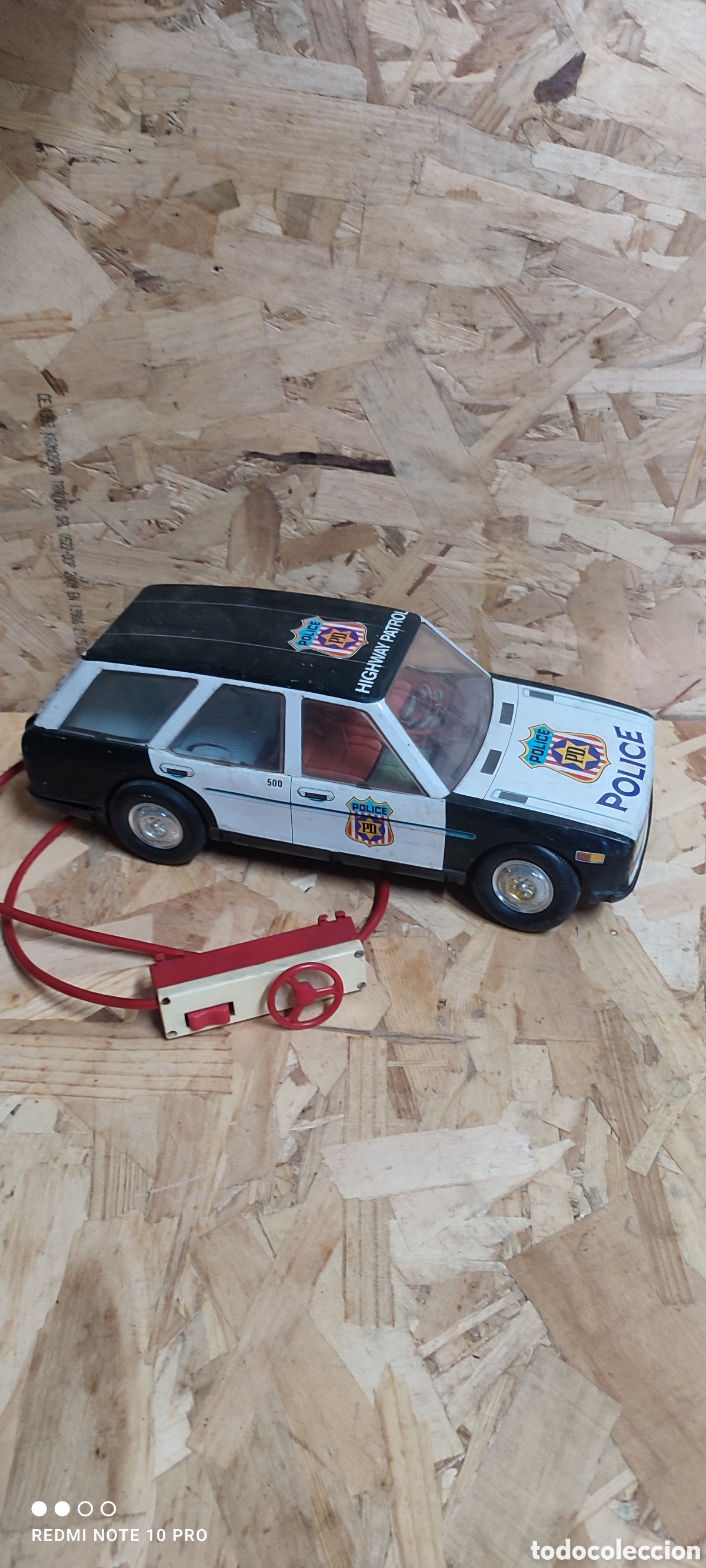 Juguetes antiguos Rom&aacute;n: Coche polic&iacute;a de Rom&aacute;n con mando, para limpiar y restaurar, no probado.