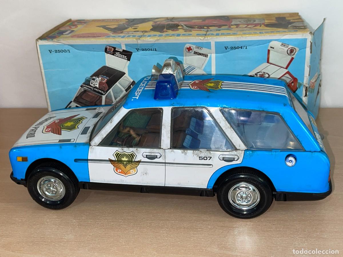 Juguetes antiguos Rom&aacute;n: Juguetes Rom&aacute;n coche SEAT 131 Radio Patrol Police Salva-Obst&aacute;culos el&eacute;ctrico a&ntilde;os 70 Made in Spain
