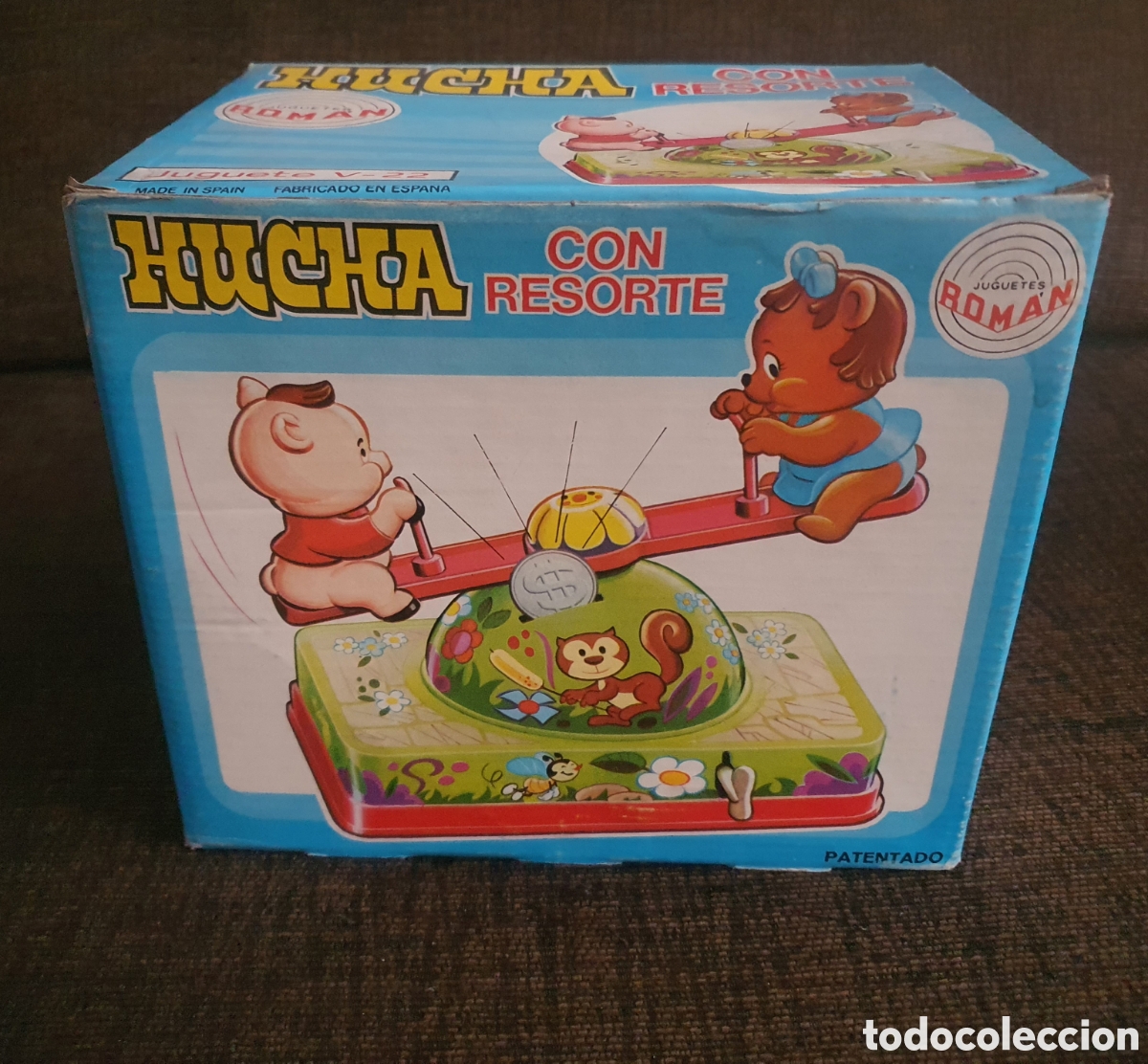 Jouets anciens Rom&aacute;n: Antigua Hucha con resorte, juguetes Rom&aacute;n, fabricada en Espa&ntilde;a, totalmente nueva