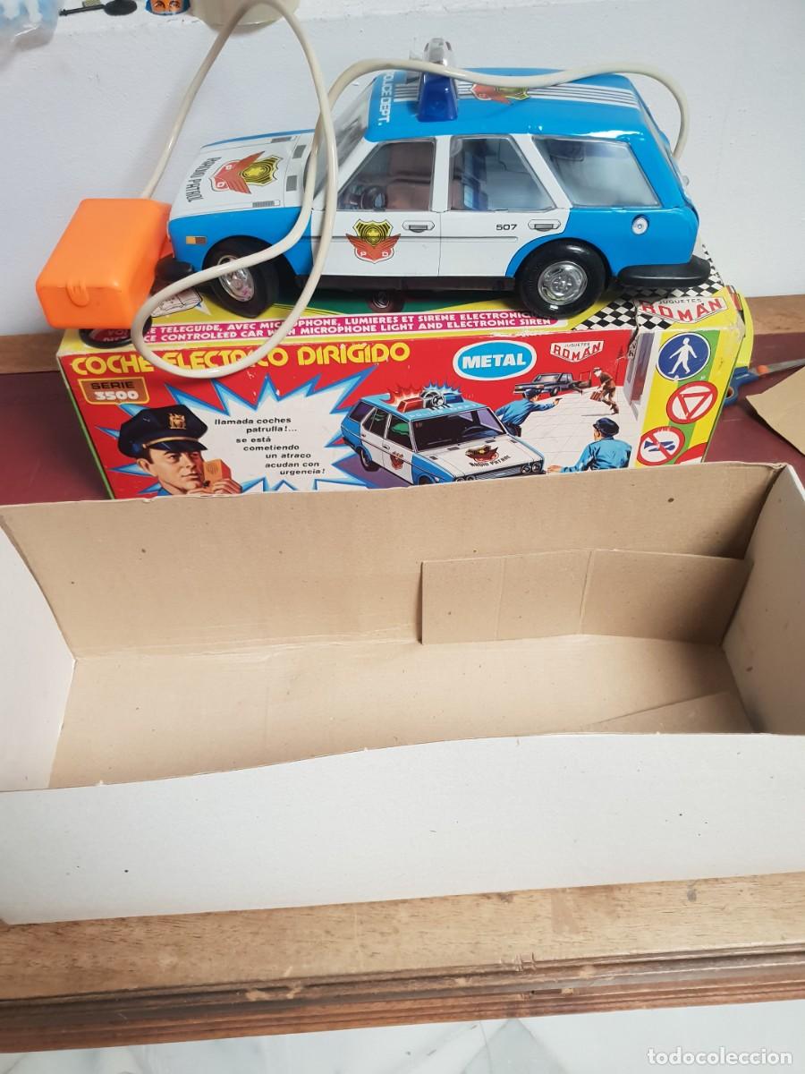 Juguetes antiguos Rom&aacute;n: Coche de policia dirigido 3500 de roman de tienda