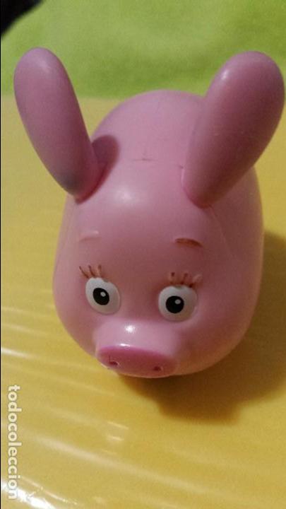 Juguetes antiguos: Cerdito con ruedas de disney. - Foto 1