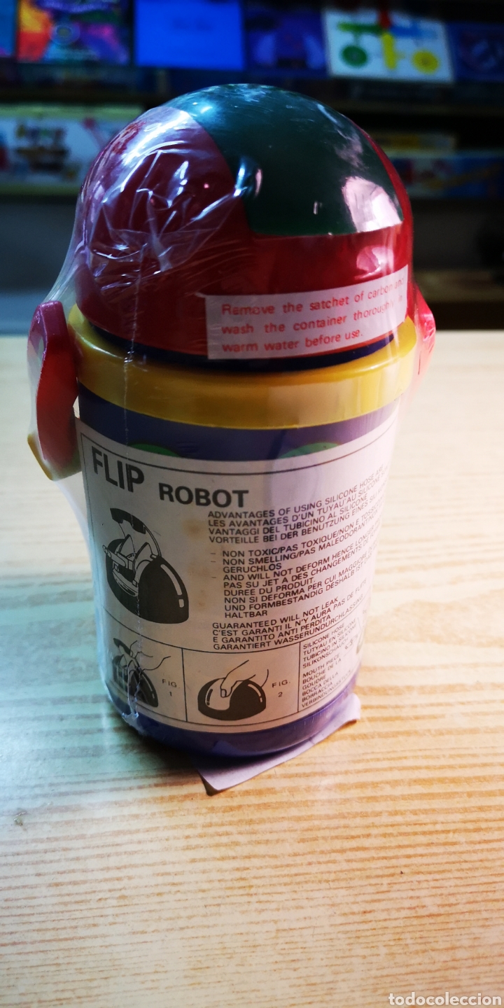 Juguetes antiguos: Disney flip robot - Foto 2
