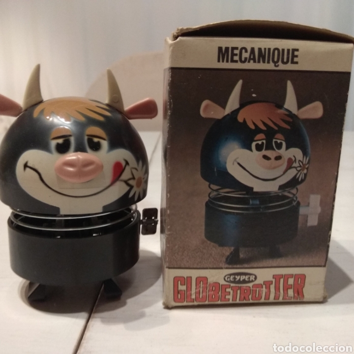 Juguetes antiguos: Vaca a resorte de Geyper - Foto 3