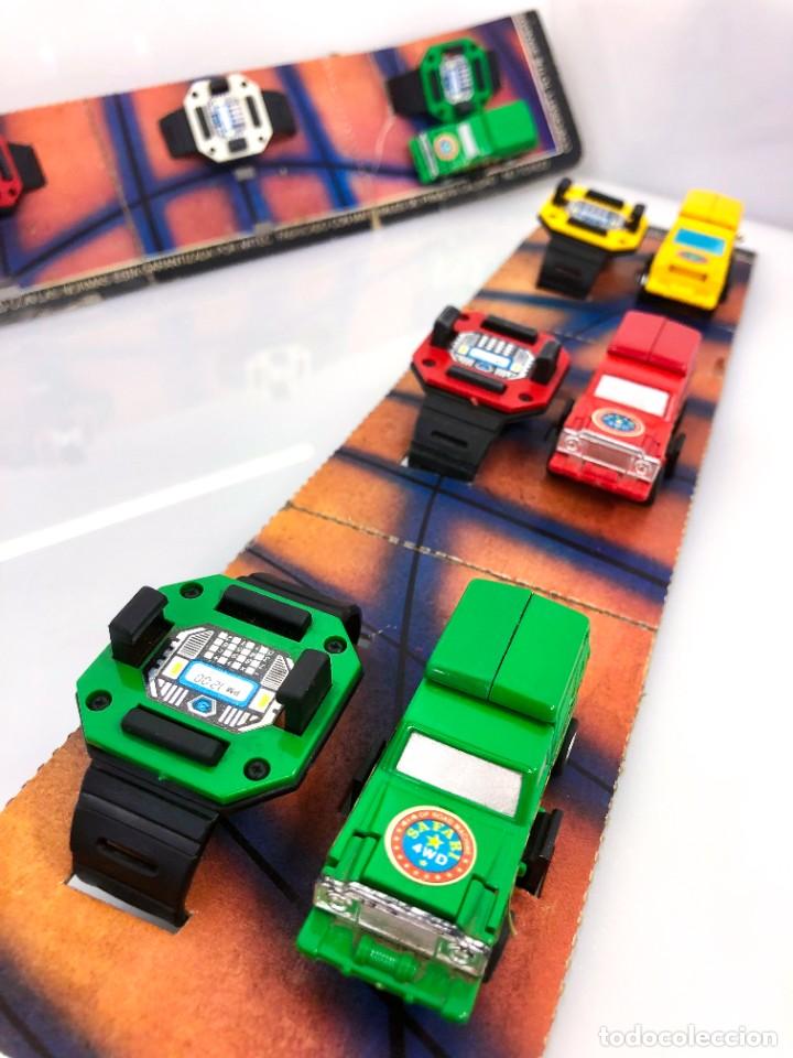 Juguetes antiguos: Lote de Transformers con pulsera tipo reloj de la marca ARTEC - Foto 14