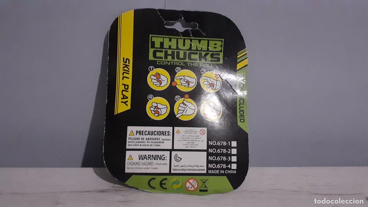 Juguetes antiguos: Blister Thumb Chucks. - Foto 3