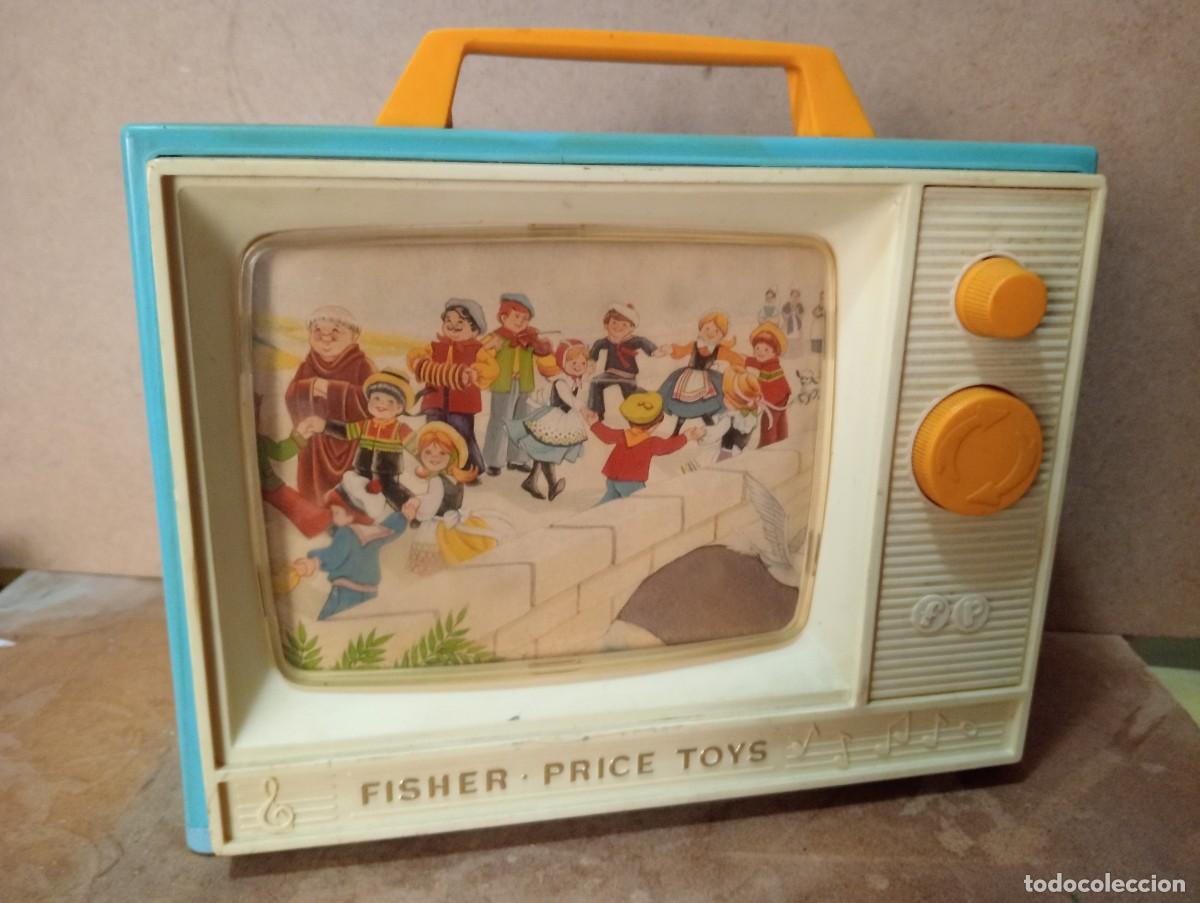 Juguetes antiguos: Televisor de juguete de cuerda - Foto 1