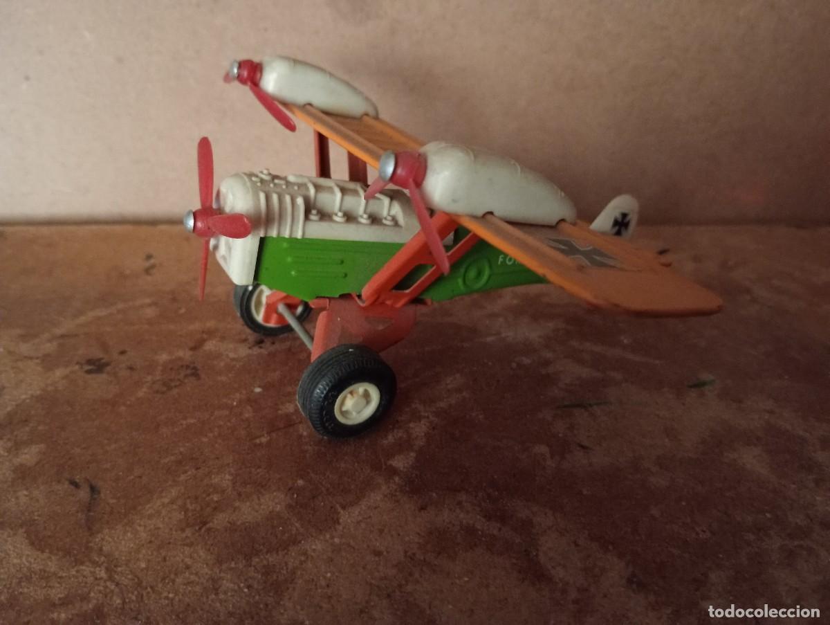 Juguetes antiguos: Avion de hojala marca SANSON - Foto 1