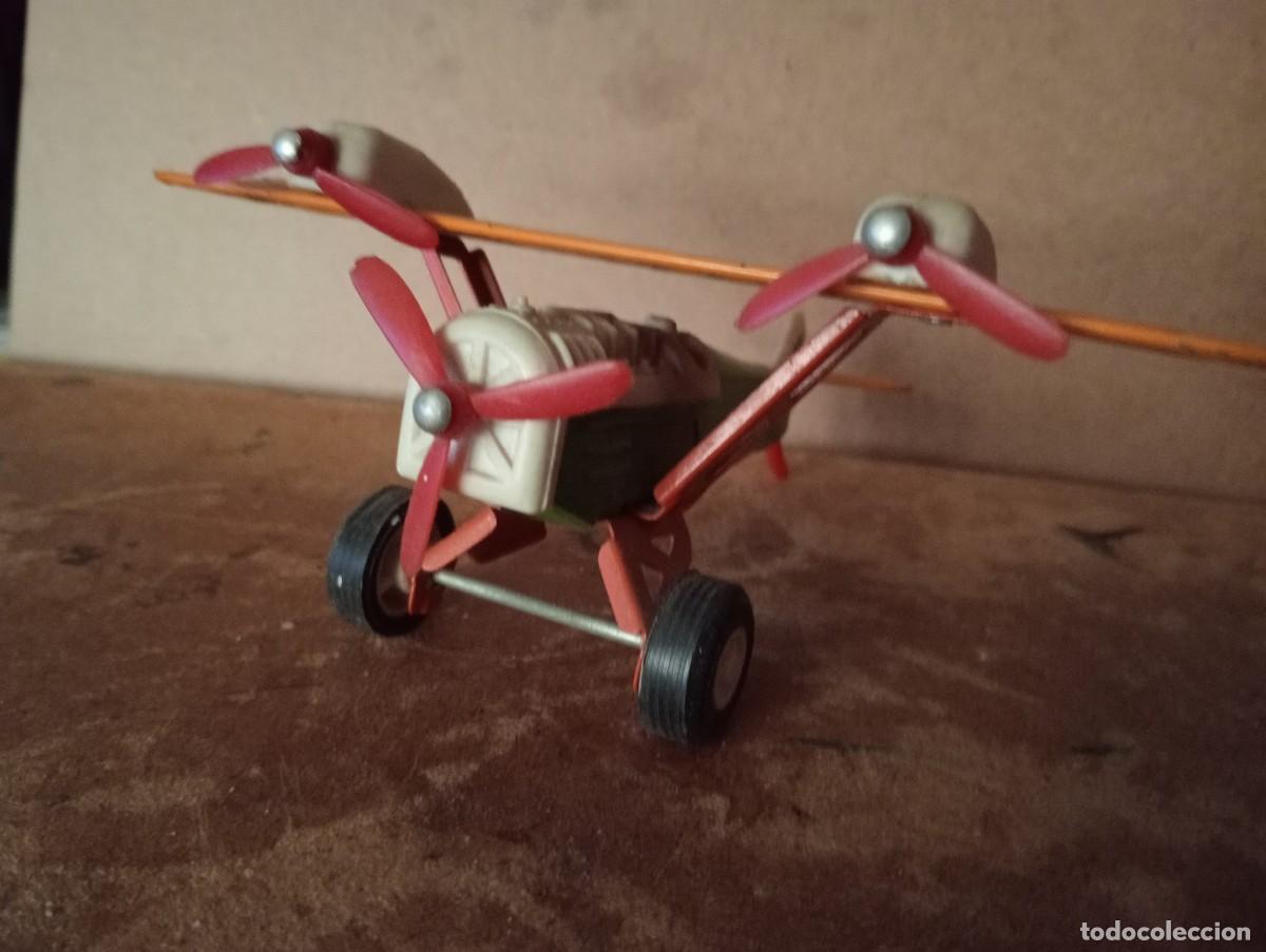 Juguetes antiguos: Avion de hojala marca SANSON - Foto 2
