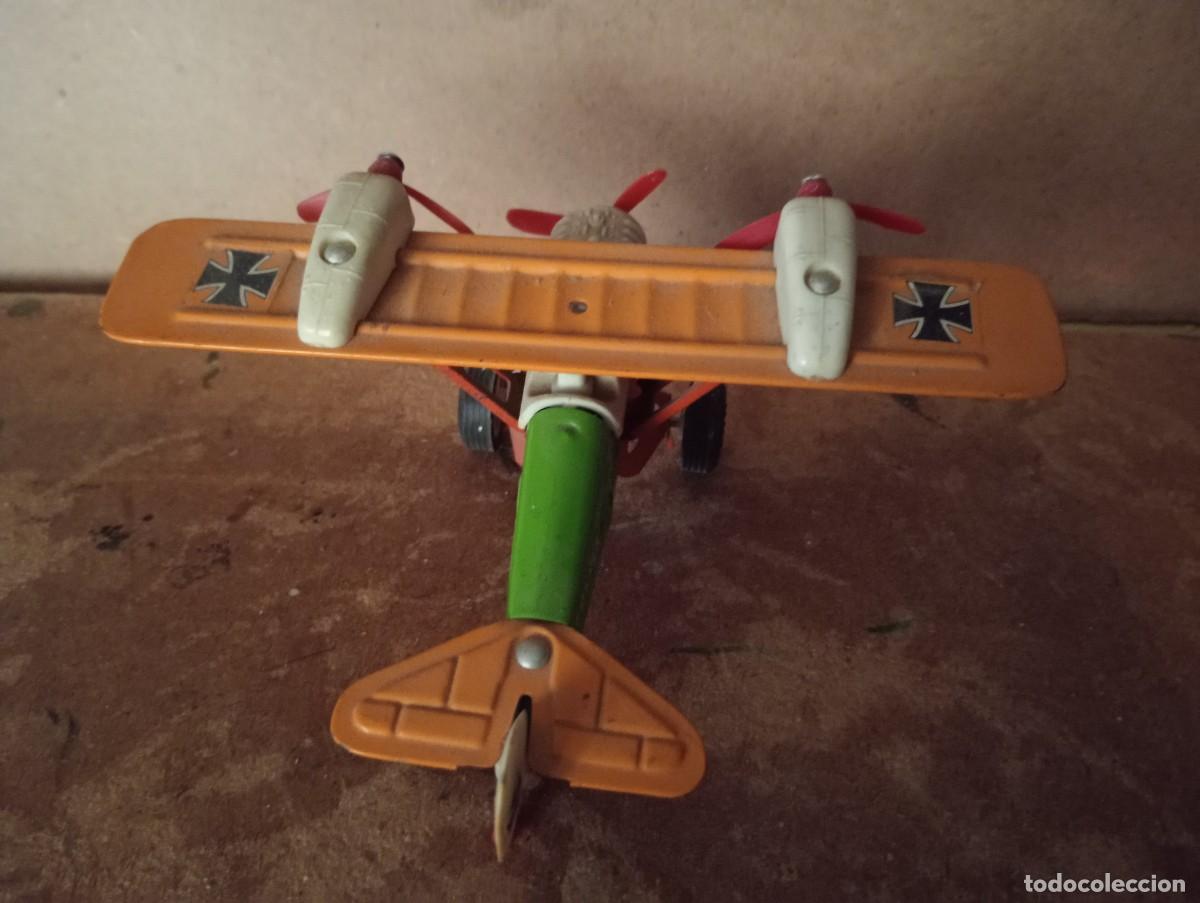 Juguetes antiguos: Avion de hojala marca SANSON - Foto 4