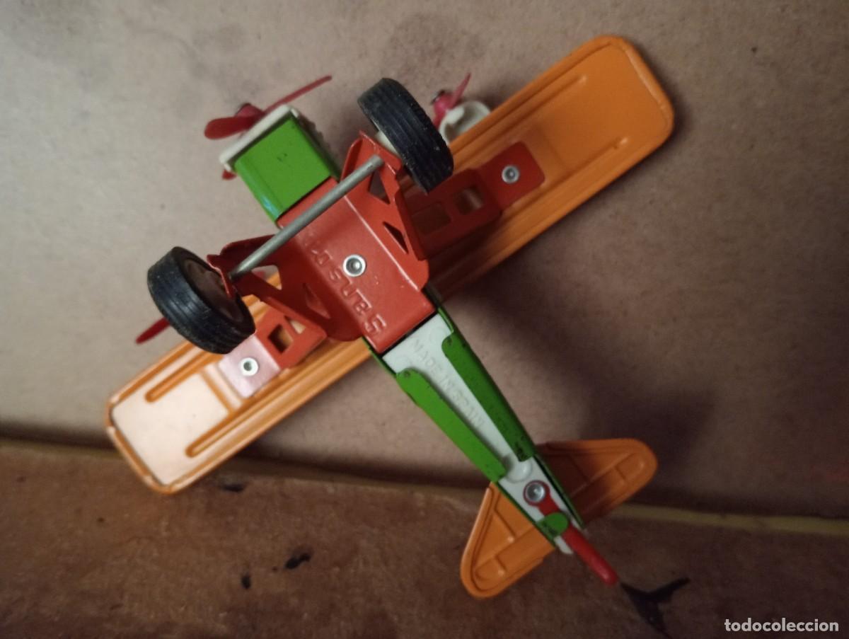 Juguetes antiguos: Avion de hojala marca SANSON - Foto 5