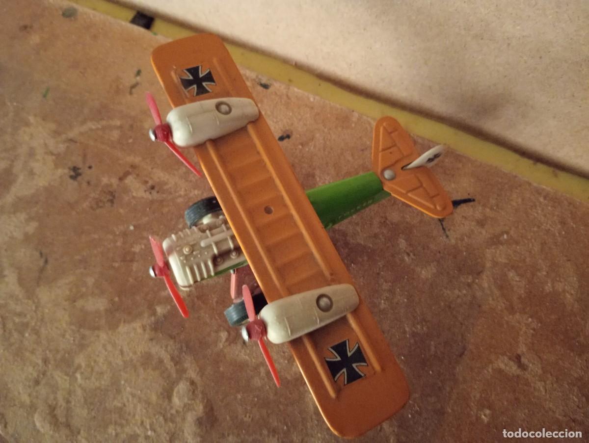 Juguetes antiguos: Avion de hojala marca SANSON - Foto 7