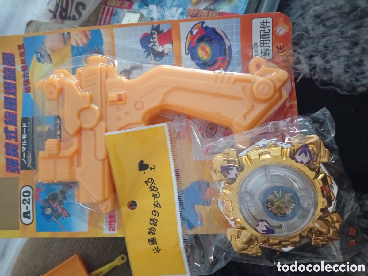 Juguetes antiguos: BEYBLADE CON LANZADOR