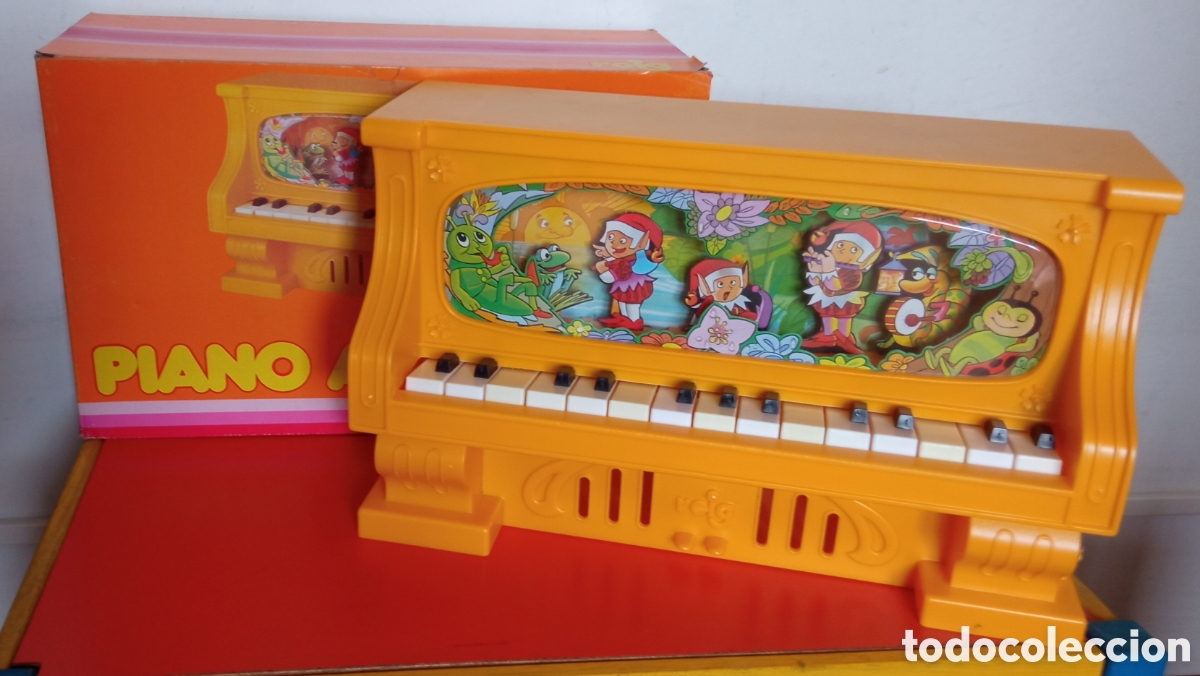 Juguetes antiguos: PIANO AMARILLO DUENDES 15 NOTAS.REIG 80'S.SIN USO,EN CAJA.CON FALLO.
