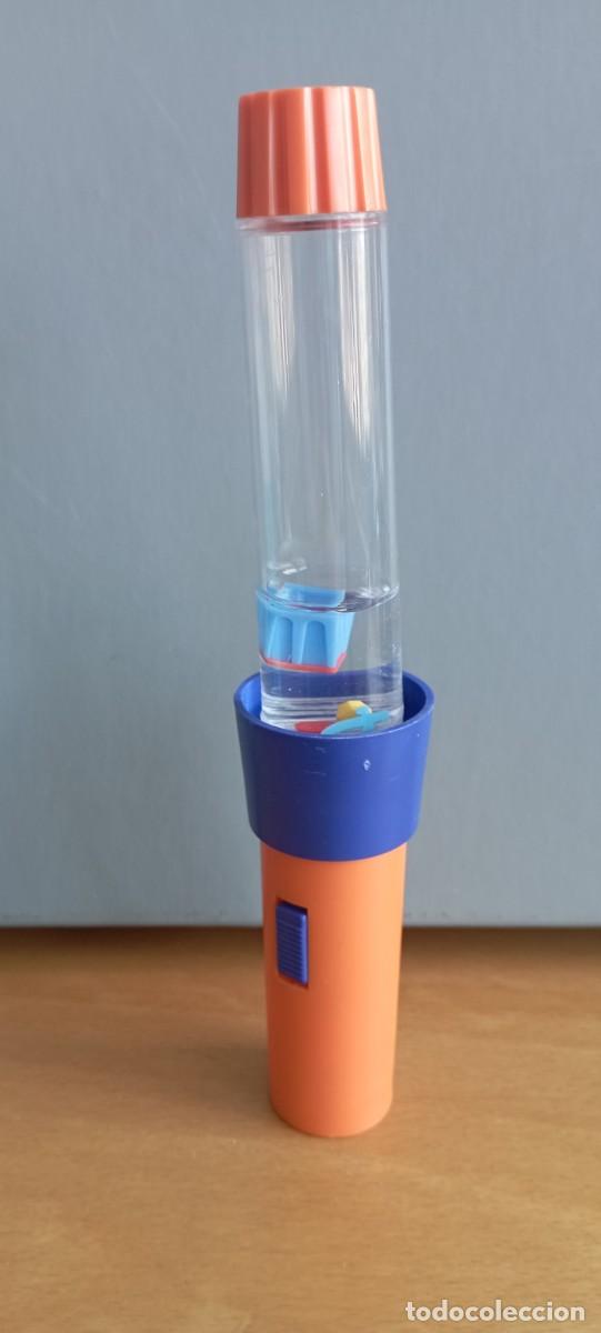 Juguetes antiguos: Linterna de juego de agua Geyper