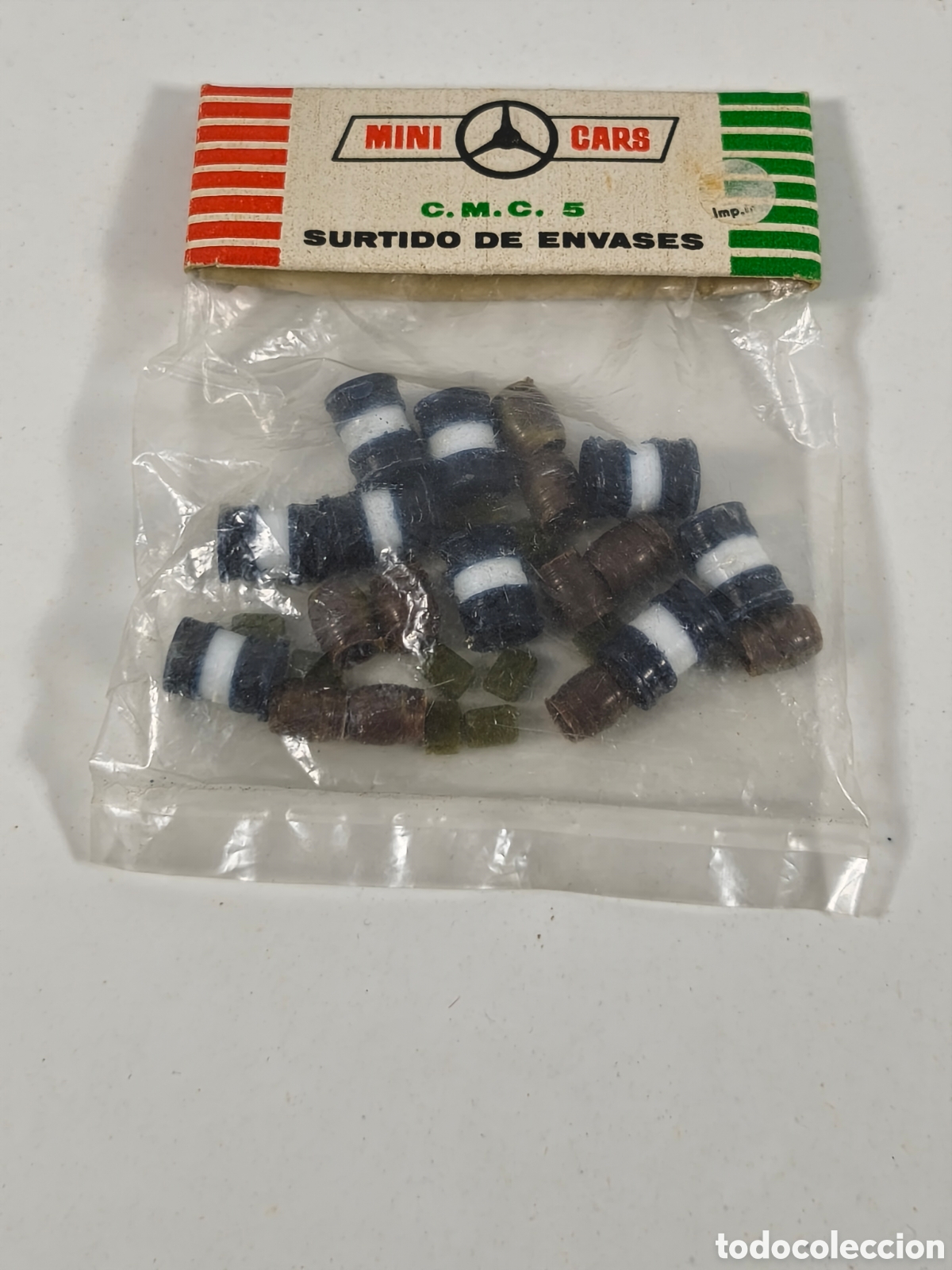 Juguetes antiguos: Bolsa minicars C.M.C. 5 surtido de envases bidones botas y sacos de Anguplas