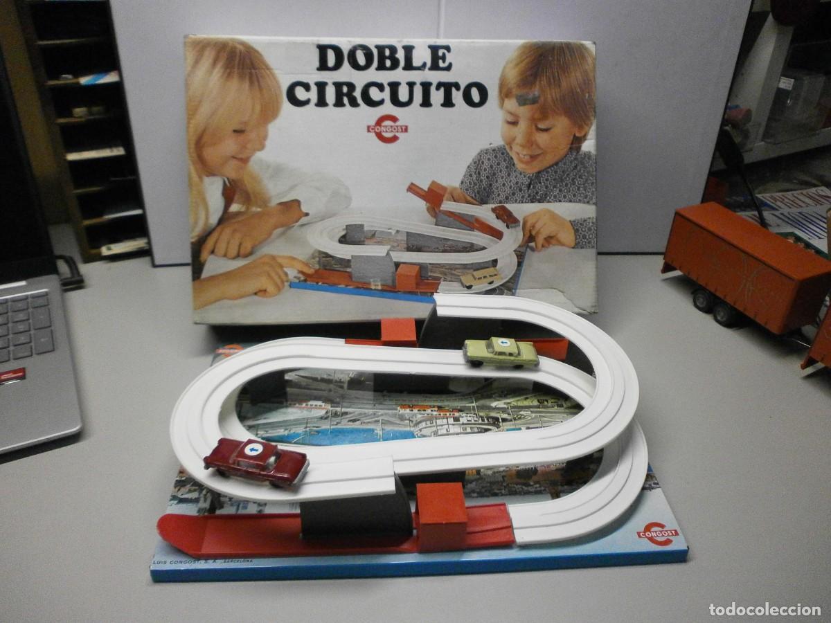 Juguetes antiguos: juguete antiguo de congost a&ntilde;o 1973 doble circuito de coches como nuevo de hojalata y plastico