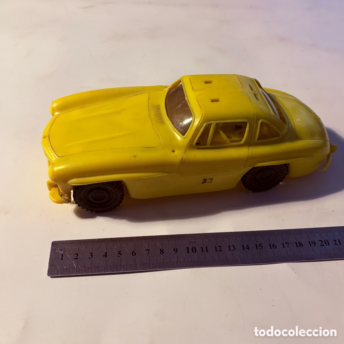 Juguetes antiguos: mercedes 300 sl friccion amarillo de juguetes pique
