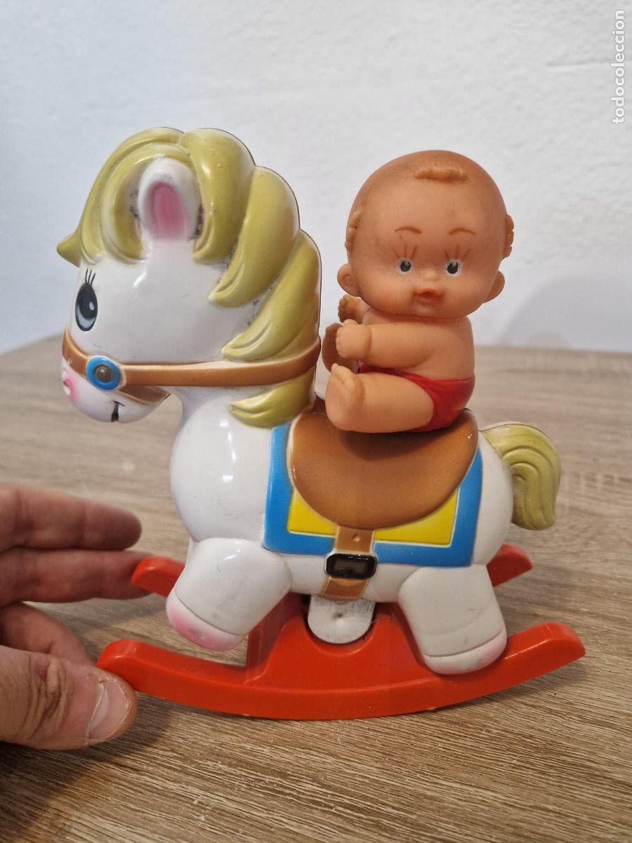Juguetes antiguos: antiguo caballo musical movimiento cuerda con bebe figura de goma MI Mecanica ibense juguete