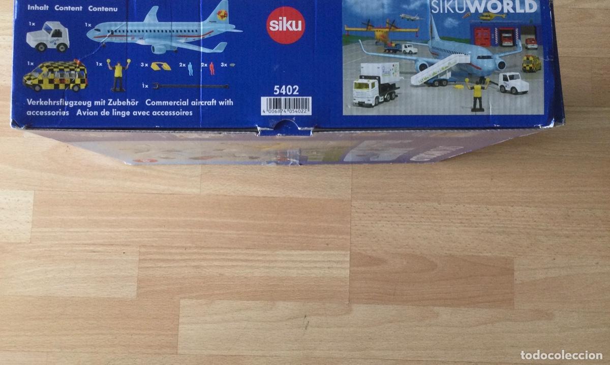 Juguetes antiguos: Avi&oacute;n comercia con accesorios. Siku. - Foto 2