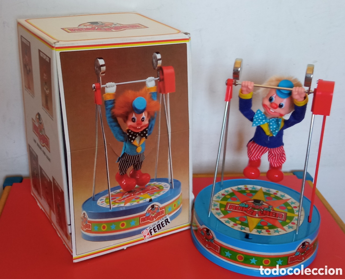 Juguetes antiguos: PAYASO ROKEFEBER TRAPECISTA A PILAS.FEBER 80'S.NUEVO EN CAJA.CON FALLO.