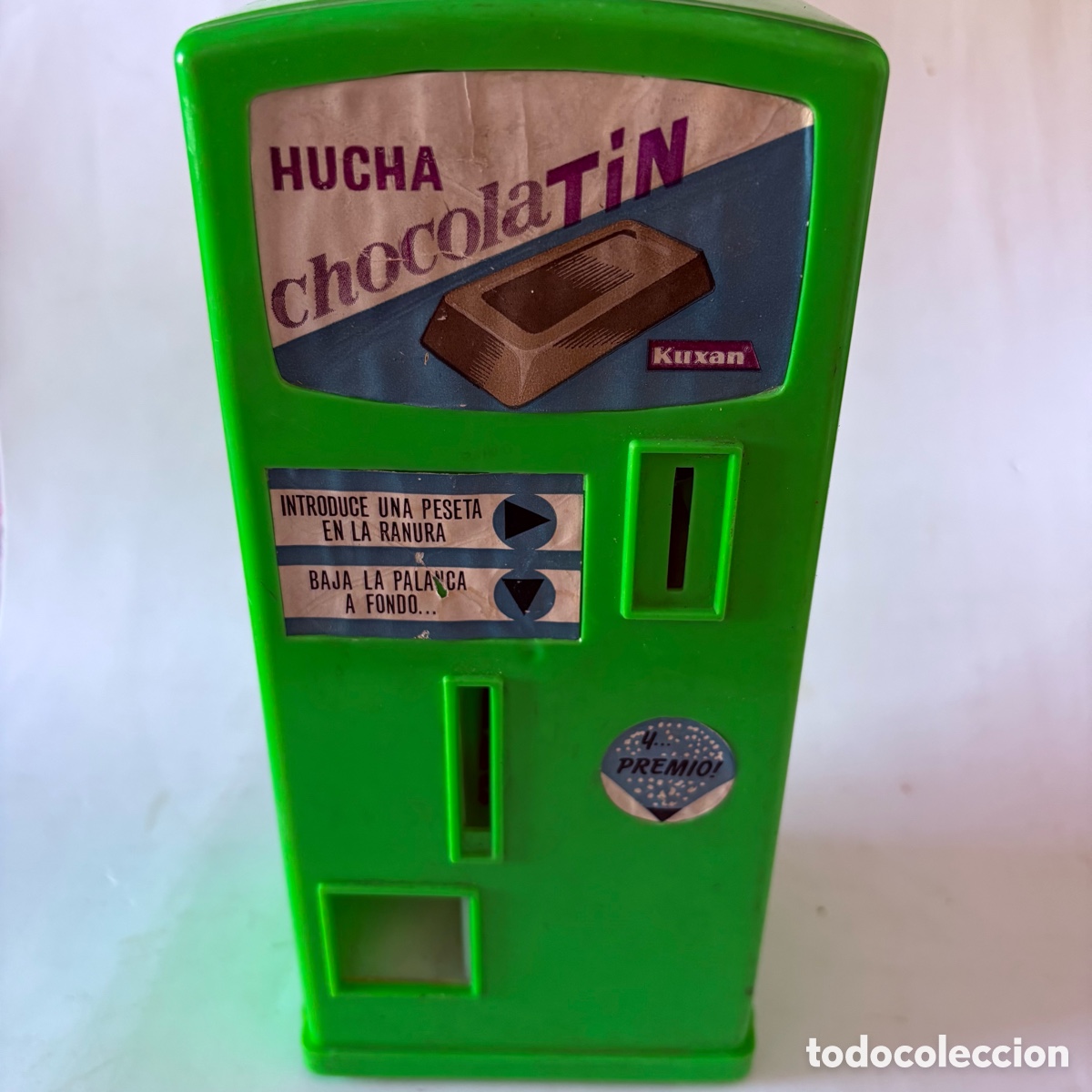 Juguetes antiguos: Hucha a&ntilde;os 70 ChocolaTIN de juguetes Kuxan