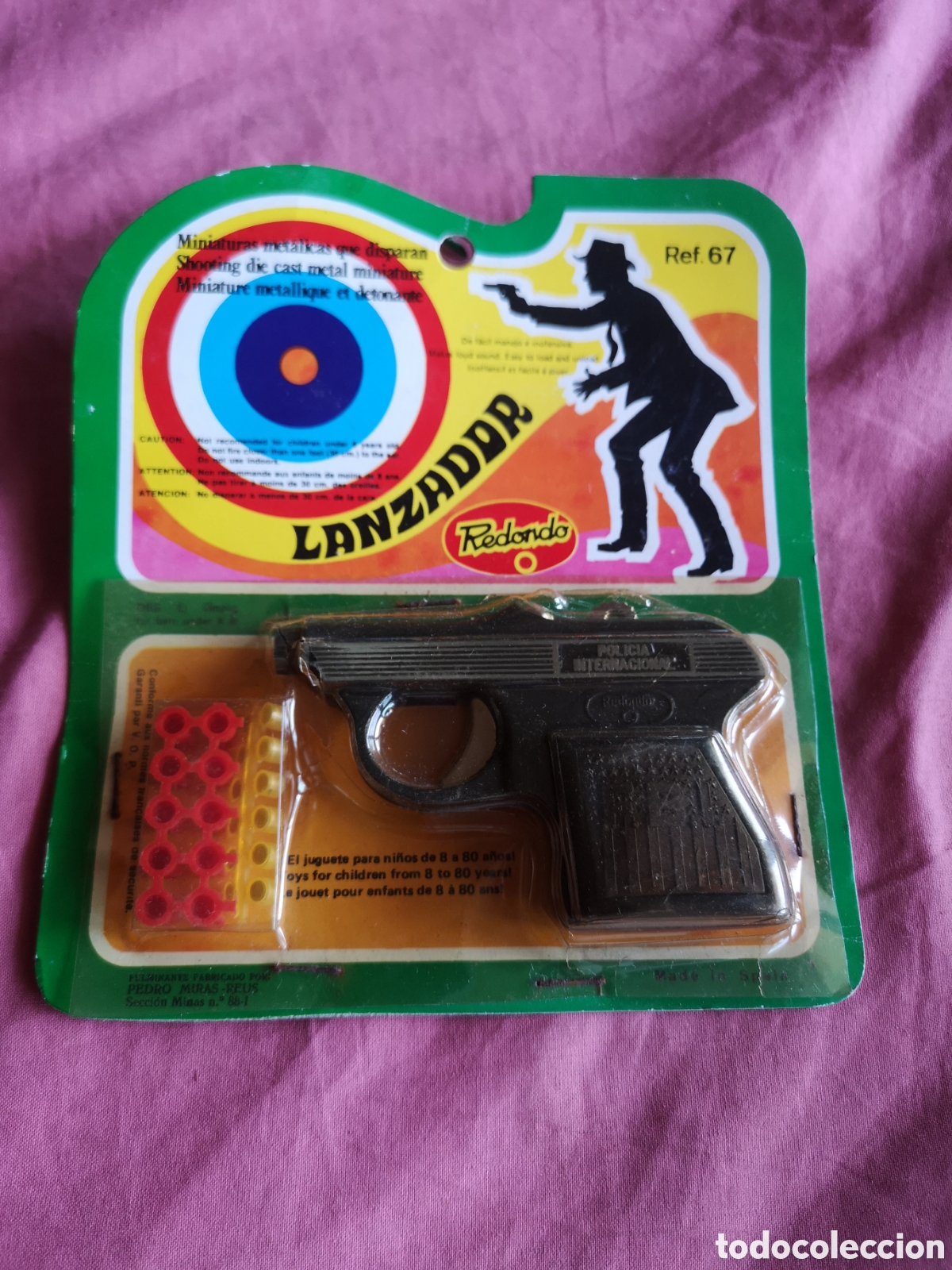 Juguetes antiguos: REDONDO. PISTOLA LANZADOR POLIC&Iacute;A. Ref67. CON FULMINANTE. Mide 10 cm. SIN ABRIR. A&ntilde;os 70.