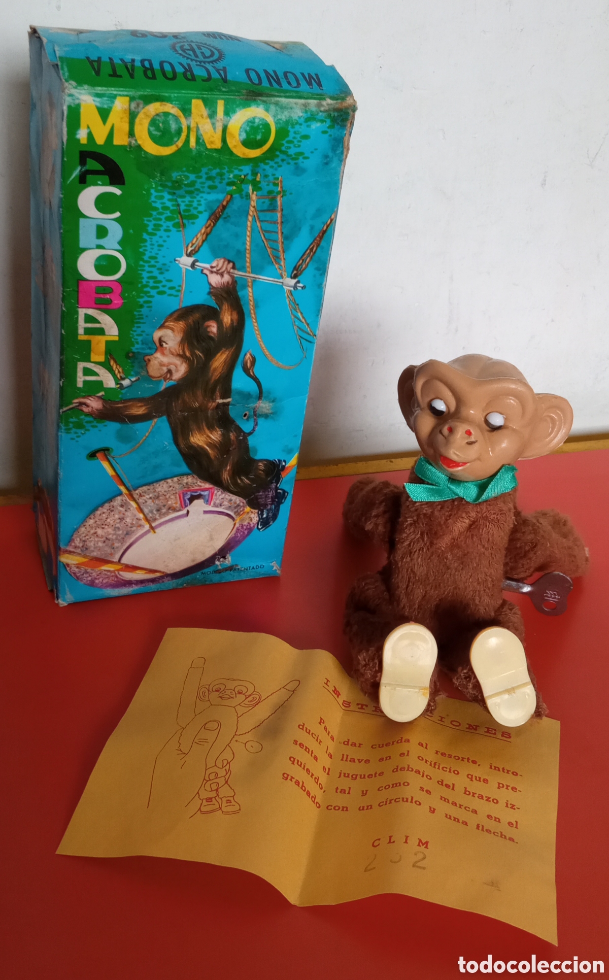 Juguetes antiguos: MONO ACR&Oacute;BATA A CUERDA RESORTE.CLIM 70'S.NUEVO EN CAJA.
