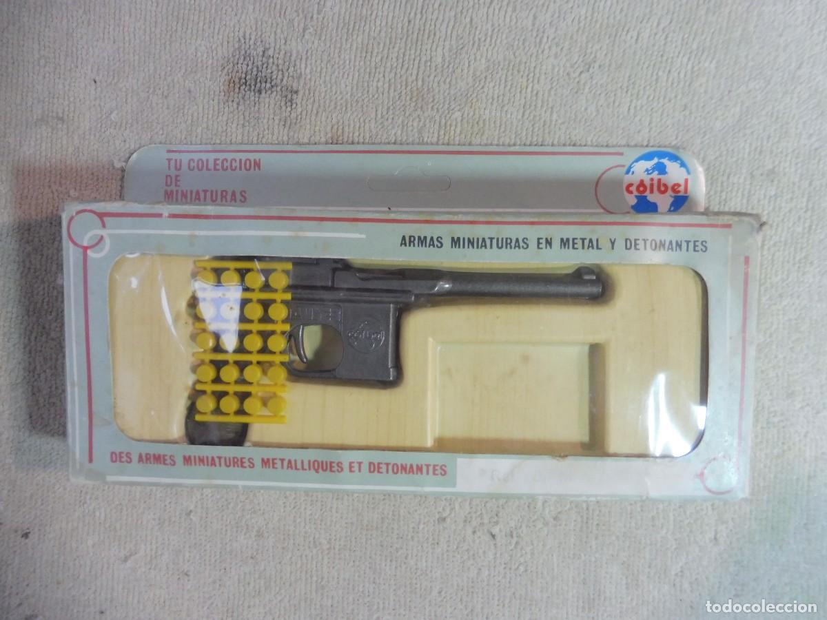 Juguetes antiguos: Armas miniaturas en metal y detonantes Mauser ref. 88 Coibel