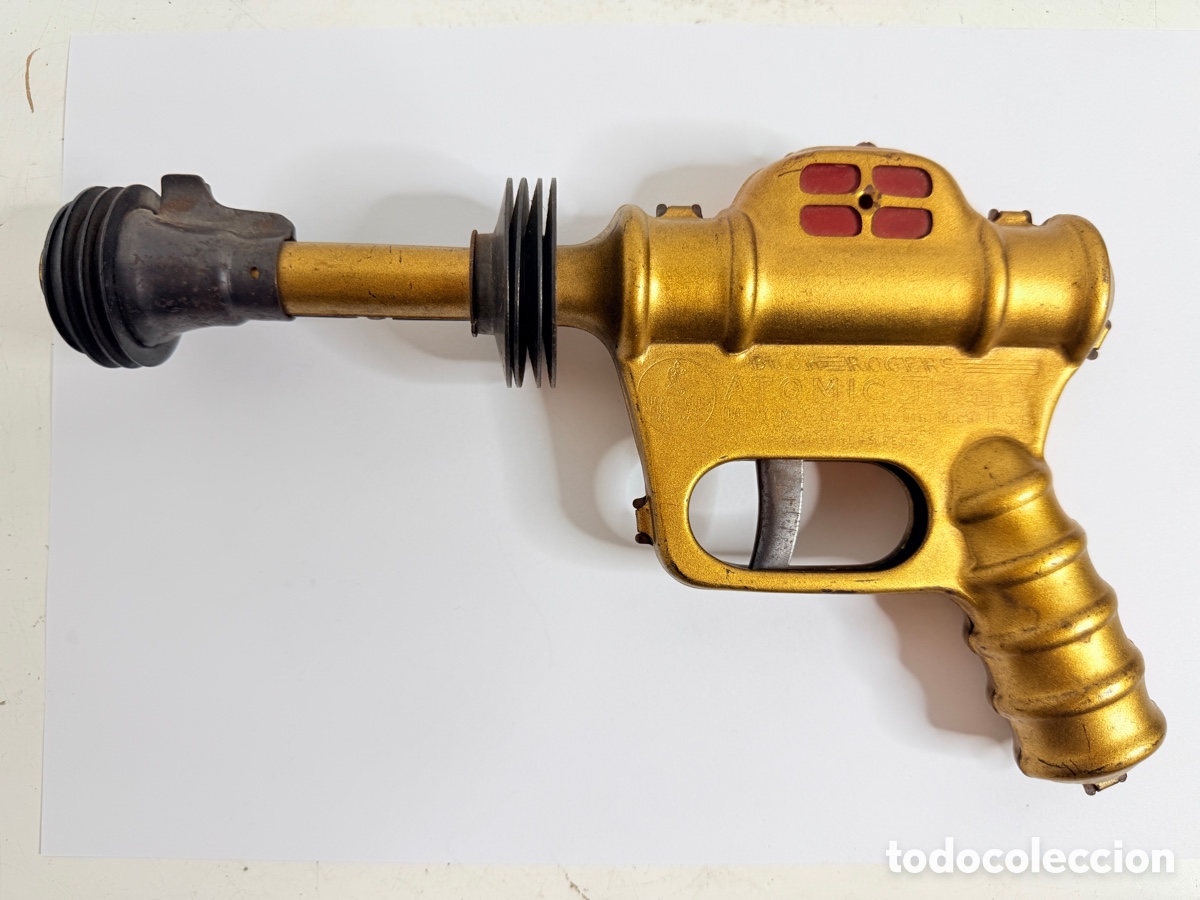 Juguetes antiguos: Vintage 1945 Buck Rogers Gold Atomic Pistol by Daisy - Strong Pop Foo Fighters