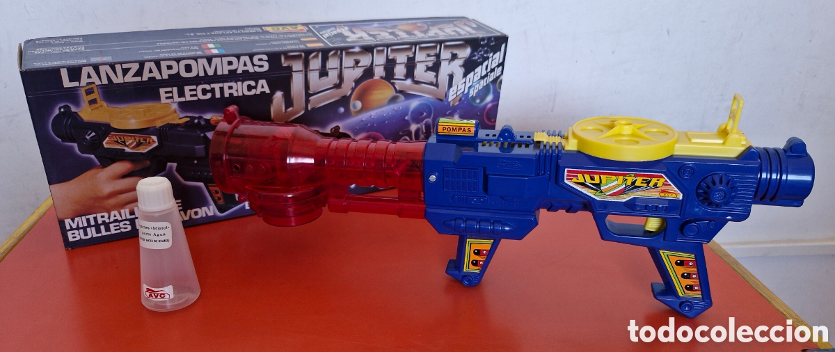 Juguetes antiguos: METRALLETA ESPACIAL J&Uacute;PITER LANZAPOMPAS EL&Eacute;CTRICA LUZ/SONIDO.AVC 80'S.NUEVA EN CAJA.NO FUNCIONA.
