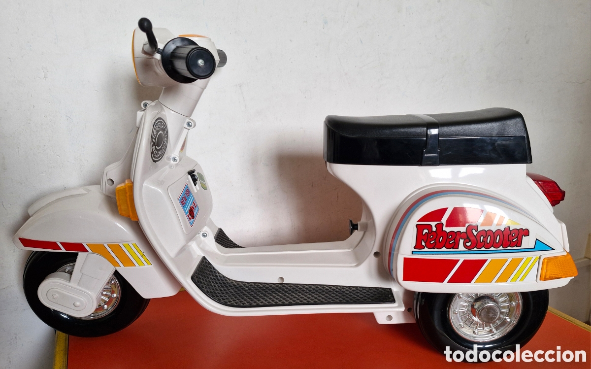 Juguetes antiguos: MOTO SCOOTER ELECTRICA.FEBER 90'S.SIN USO.INCOMPLETA.
